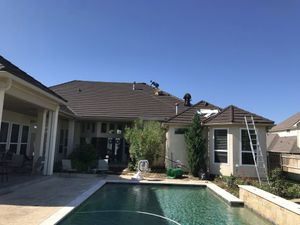 Roofing project in progress showing professional techniques